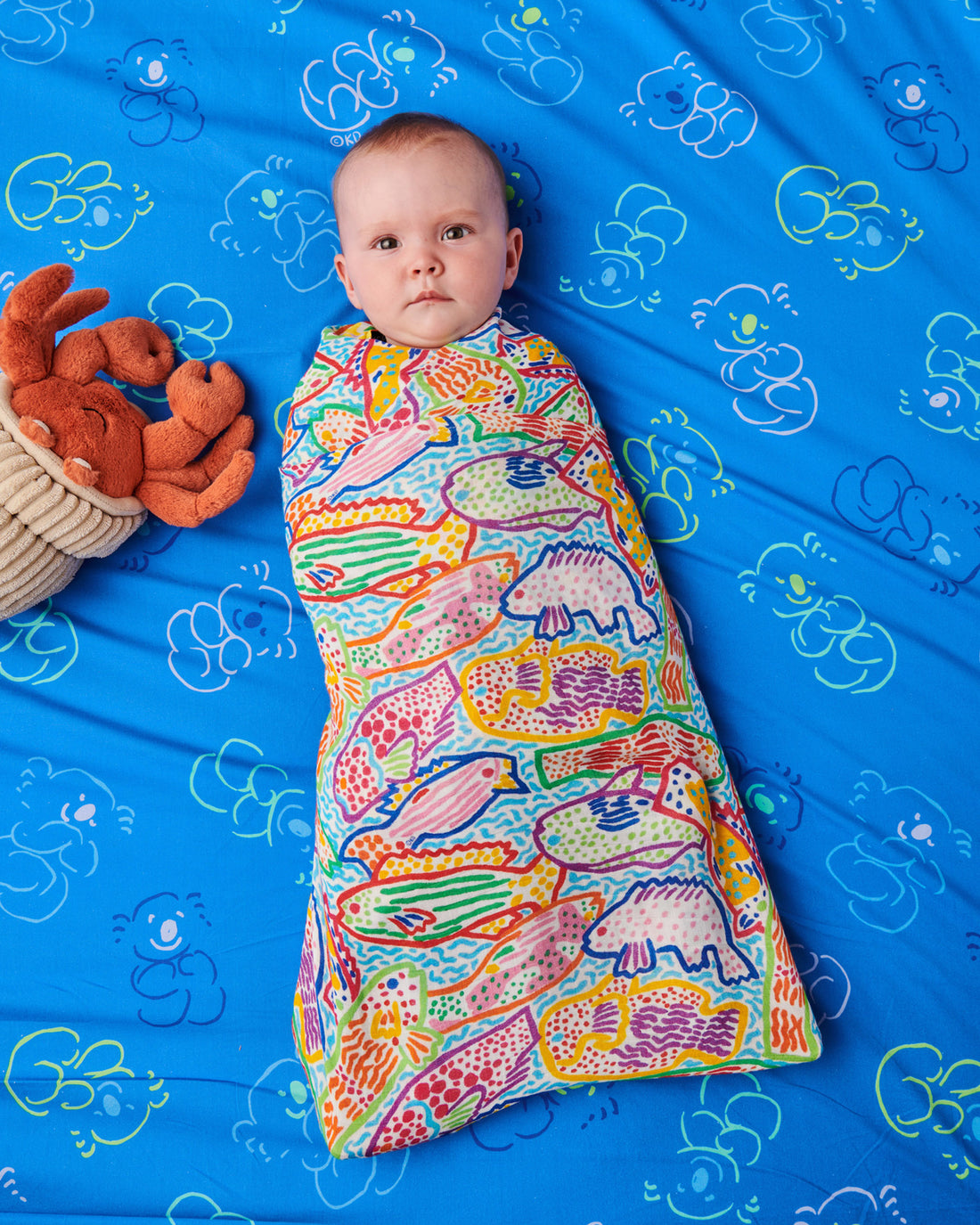 Kip&Co x Ken Done Rainbow Fish Bamboo Swaddle